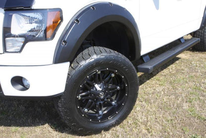 Lund 16-17 Toyota Tacoma RX-Rivet Style Smooth Elite Series Fender Flares - Black (4 Pc.)